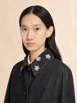 Black denim jacket with daisy appliqués