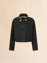 Black denim jacket with daisy appliqués